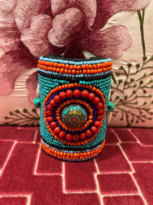 Bracciale alto con perline coralli turchesi conchiglie