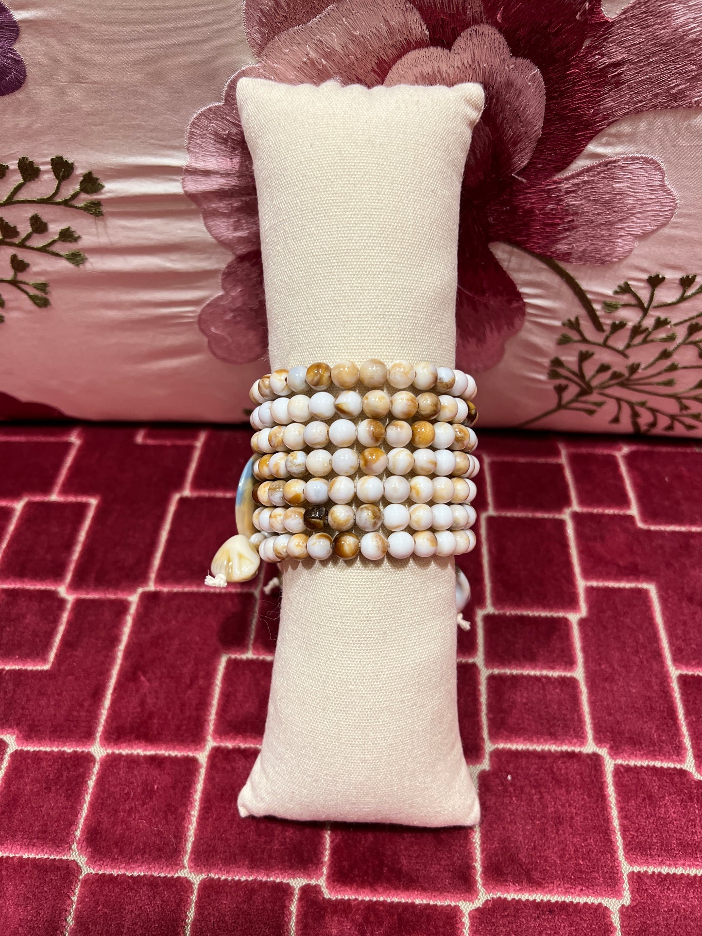 Bracciale perle beige e marroni con elementi circolari multifili