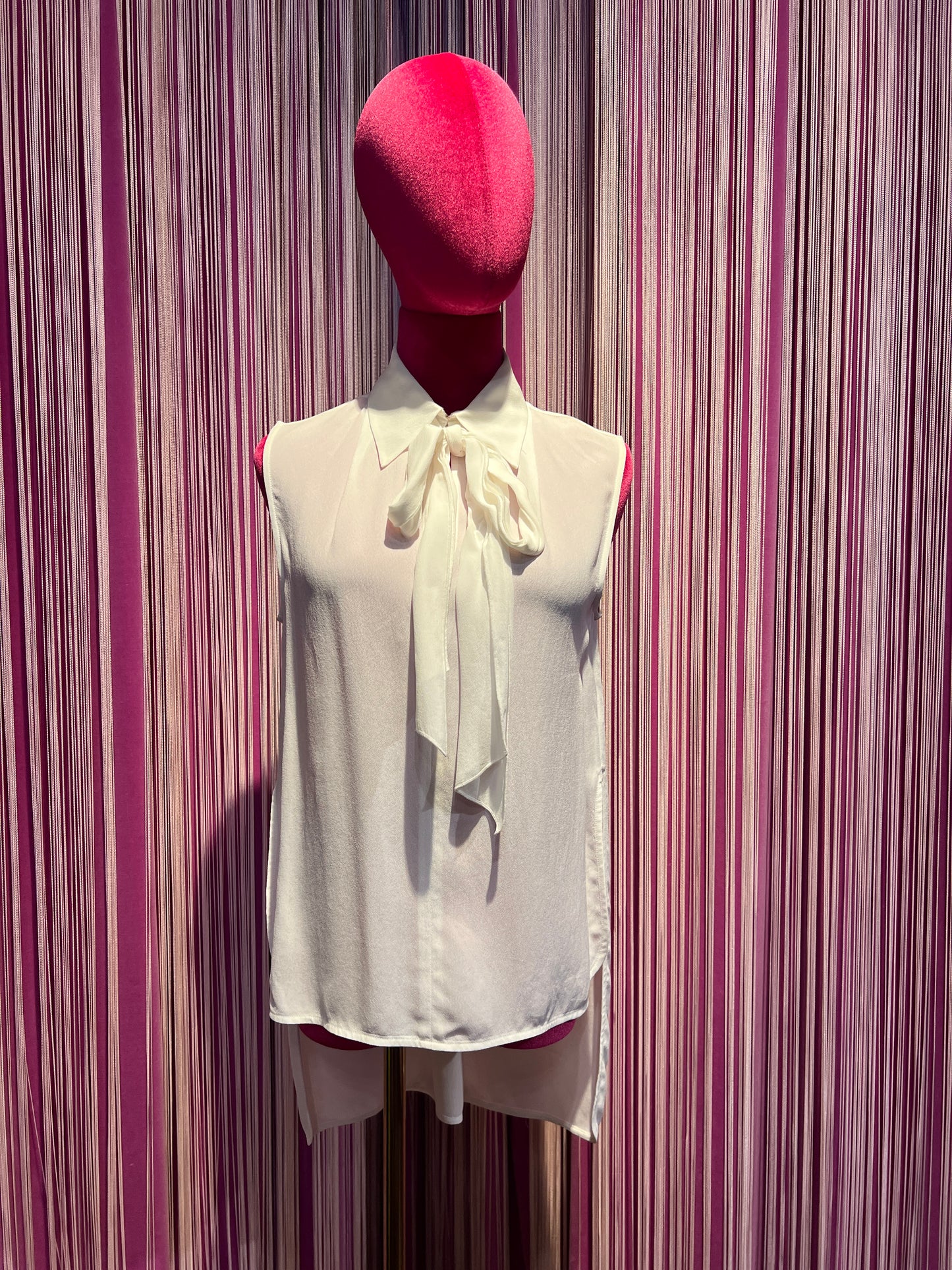 Nenette occasione imperdibile blusa senza maniche con fiocco