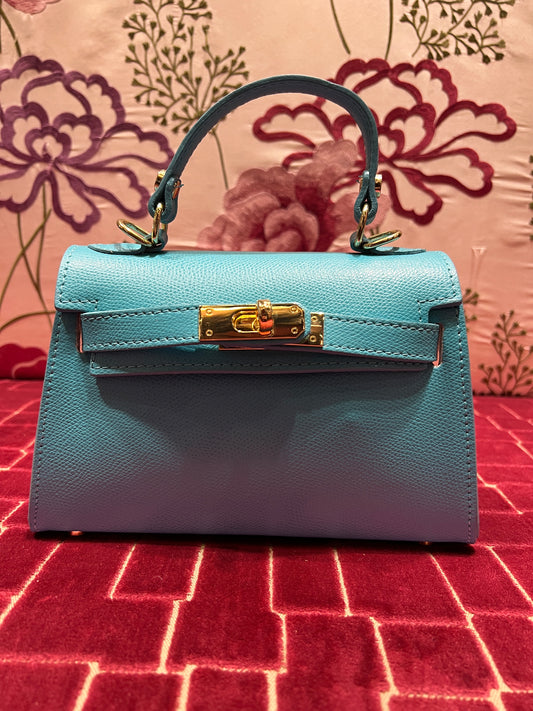 Borsa in pelle a mano azzurra con tracolla