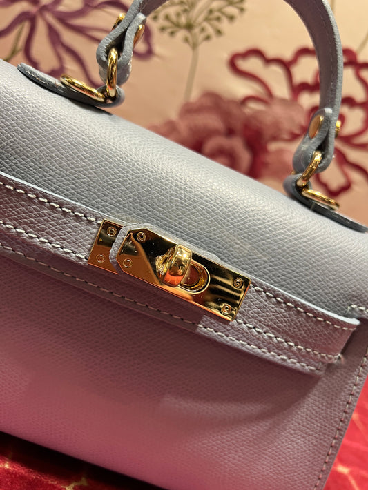 Borsa a mano in pelle celeste con tracolla