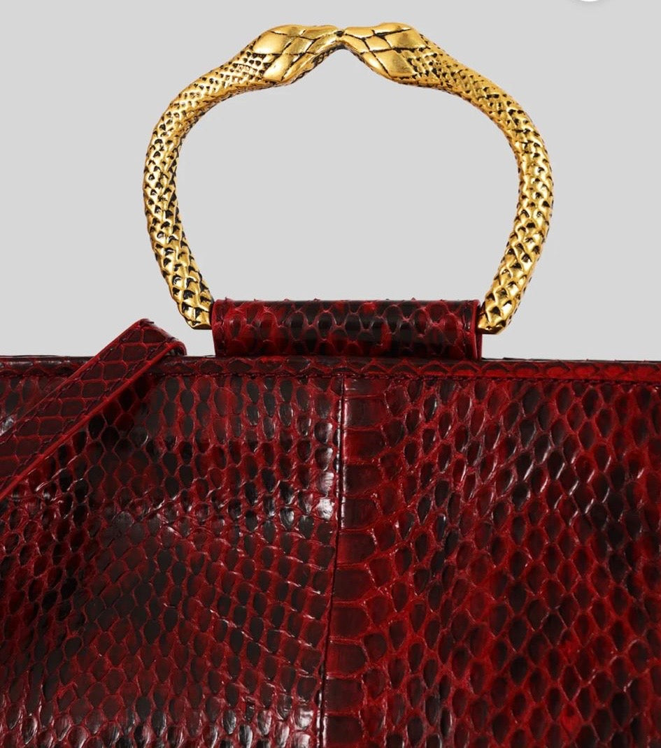 Tramontano -20% di sconto clutch pelle serpente bordo bracciale ottone con tracollina