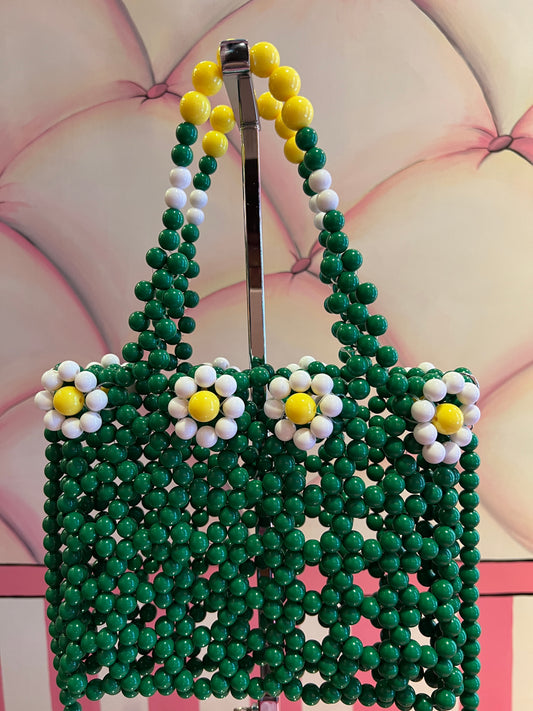 Borsa perle in resina verde con margherite bianche e gialle e tracolla