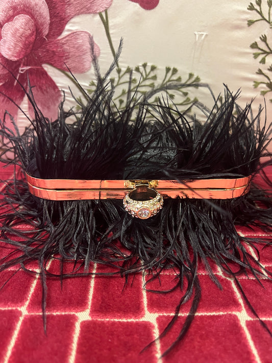 Clutch marabu nera con tracollina
