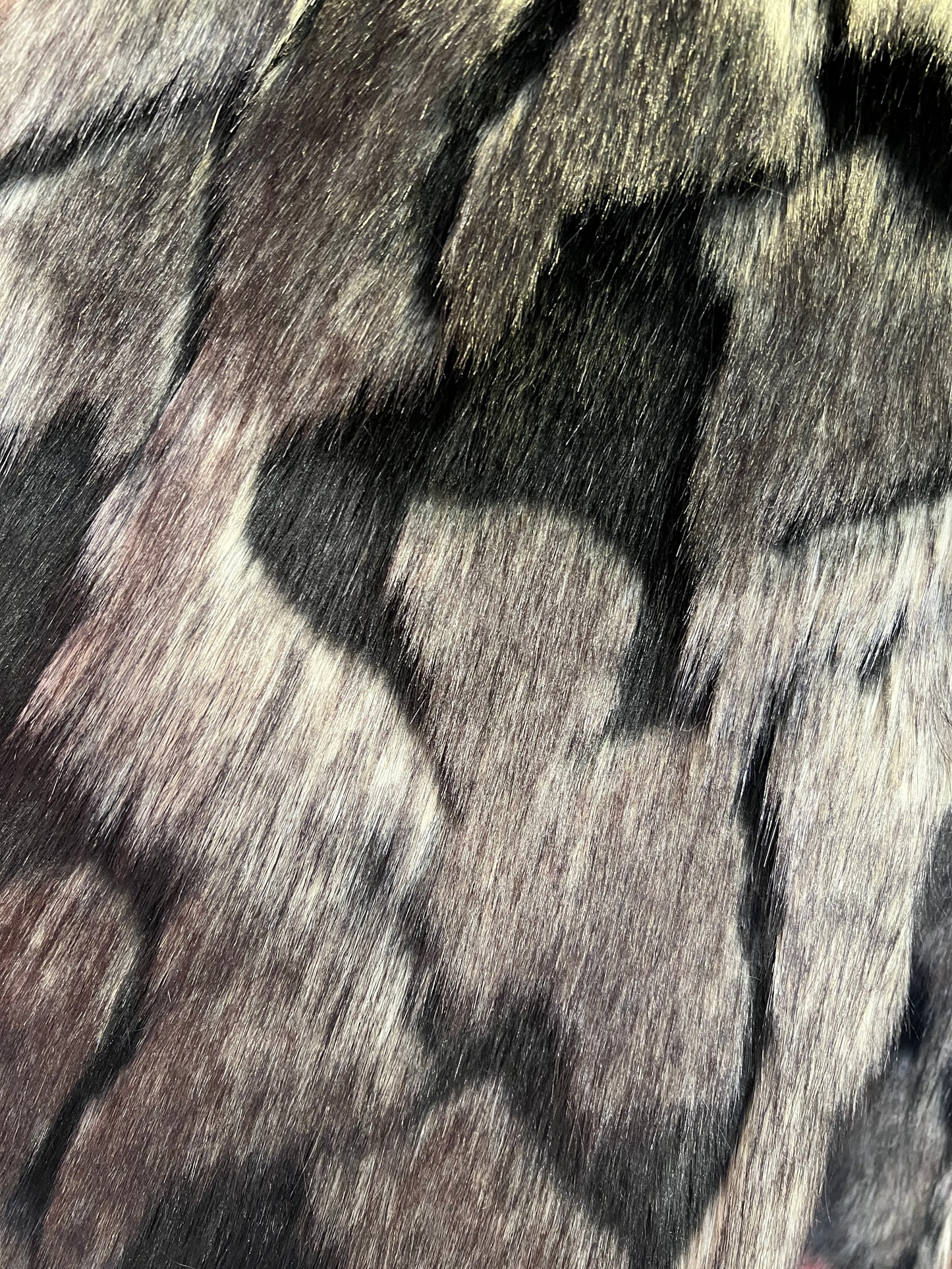 Uncommon cappotto lungo ecopelliccia astrakan nero panna