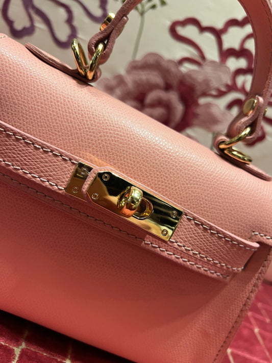 Borsa a mano rosa in pelle con tracolla