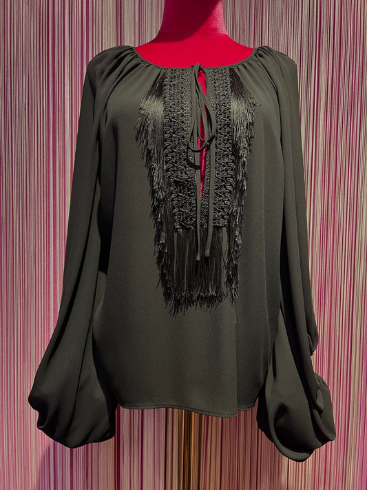 Dahlo blusa girocollo con frangia e maniche ampie