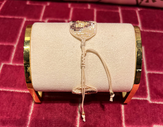 Bracciale cuori perline rosa e oro regolabile fondo panna