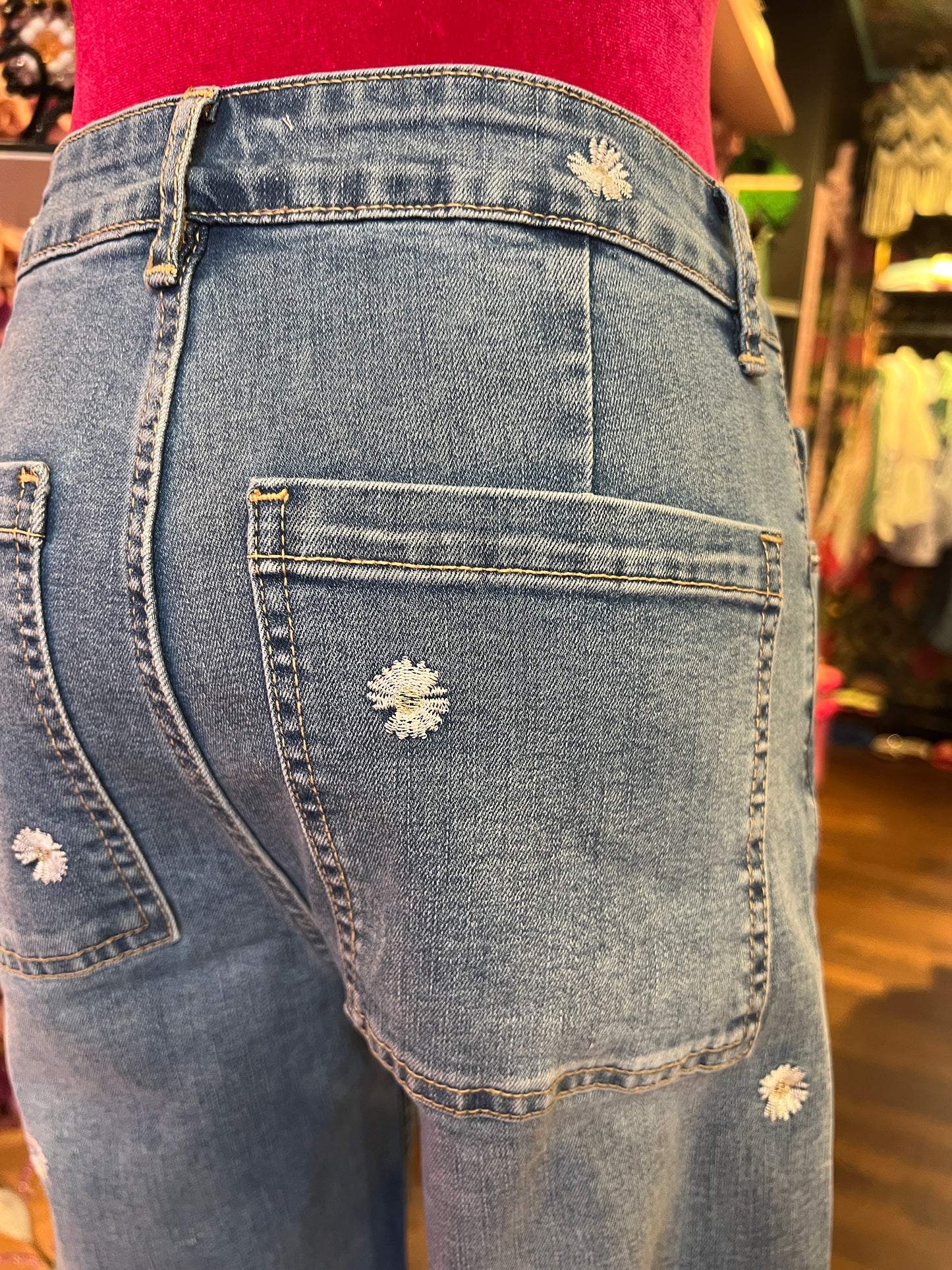 Mon amour Paris jeans con fiori bianchi orlo taglio vivo elasticizzato medio