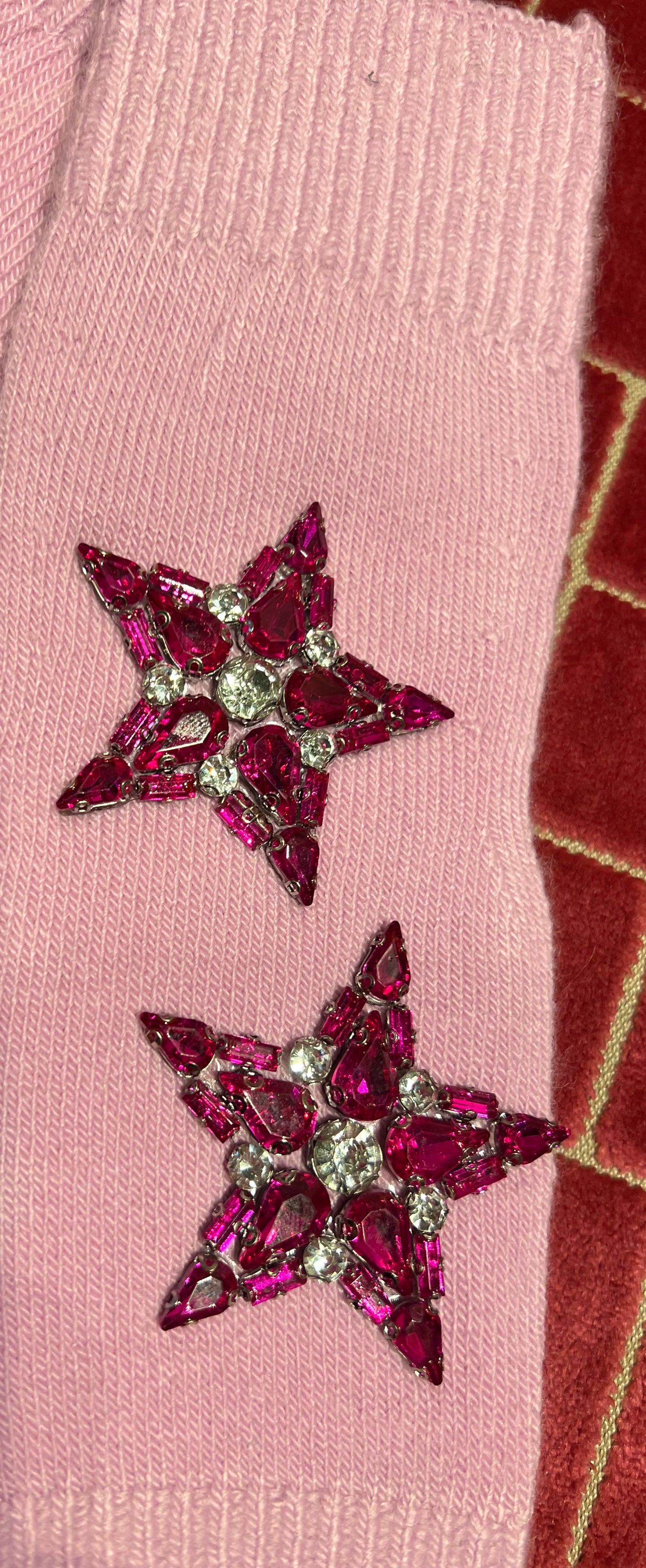 Guanti con stelle rosa