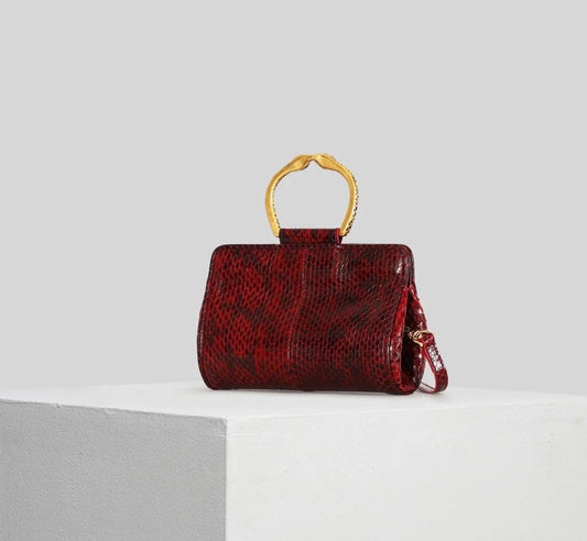 Tramontano -20% di sconto clutch pelle serpente bordo bracciale ottone con tracollina