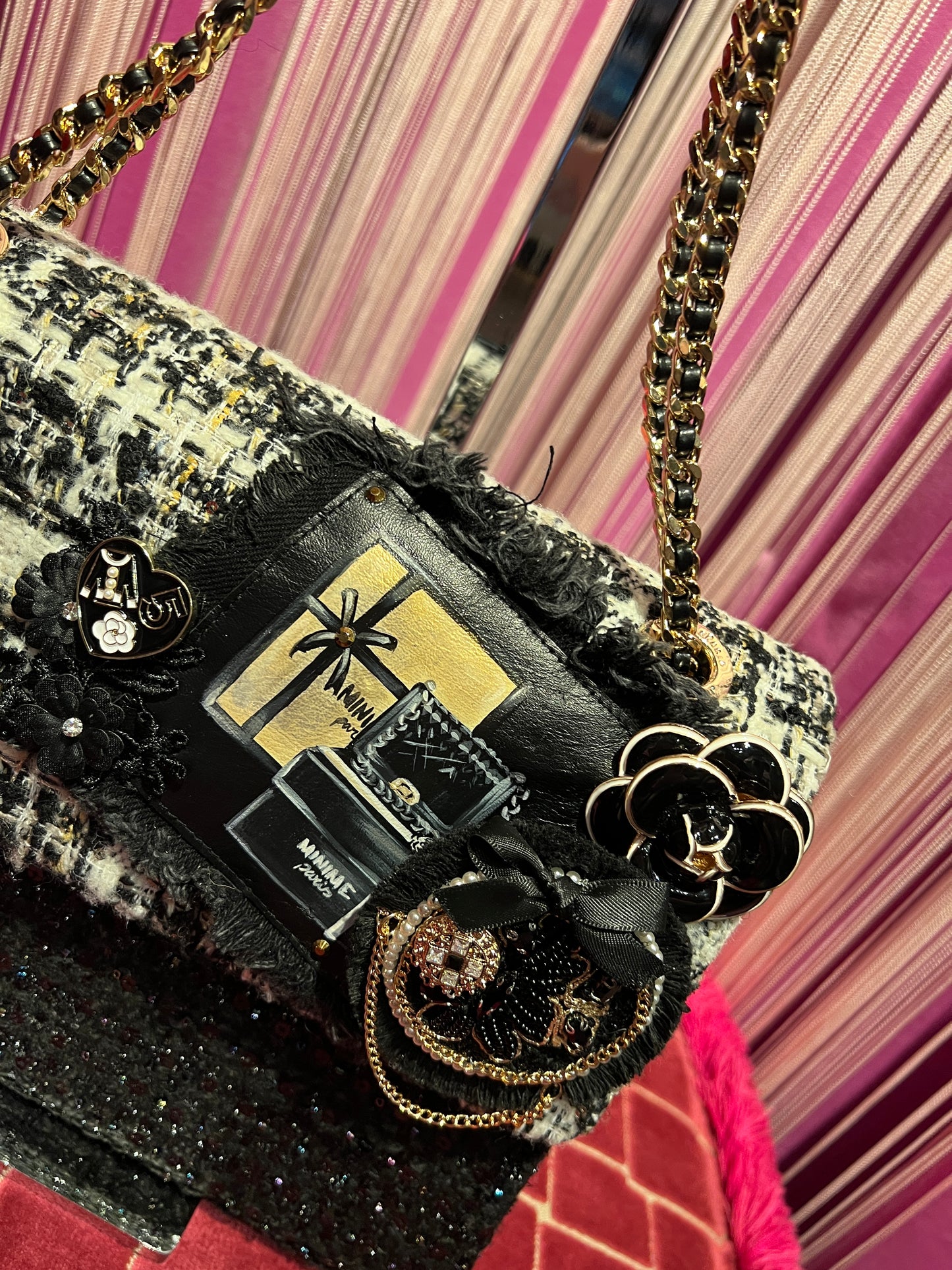 Minime Paris -50%borsa tweed nera e bianca doppia catena