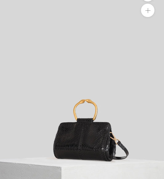 Tramontano -20 % di sconto clutch in pelle di serpente nera con bracciale in ottone e tracollina removibile