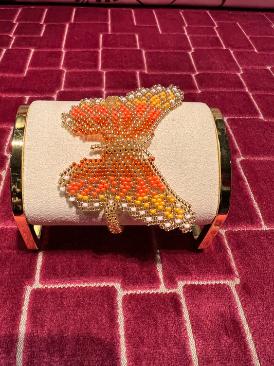 Bracciale farfalla perline oro e arancio