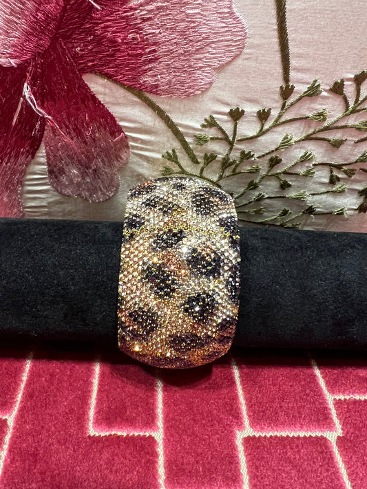 Bracciale alto fantasia maculata con strass