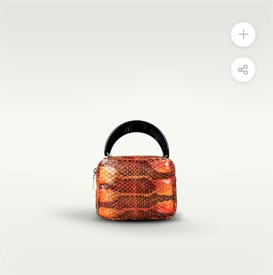 Almala sconto 20% borsa rettile arancio manico resina con tracolla metallo