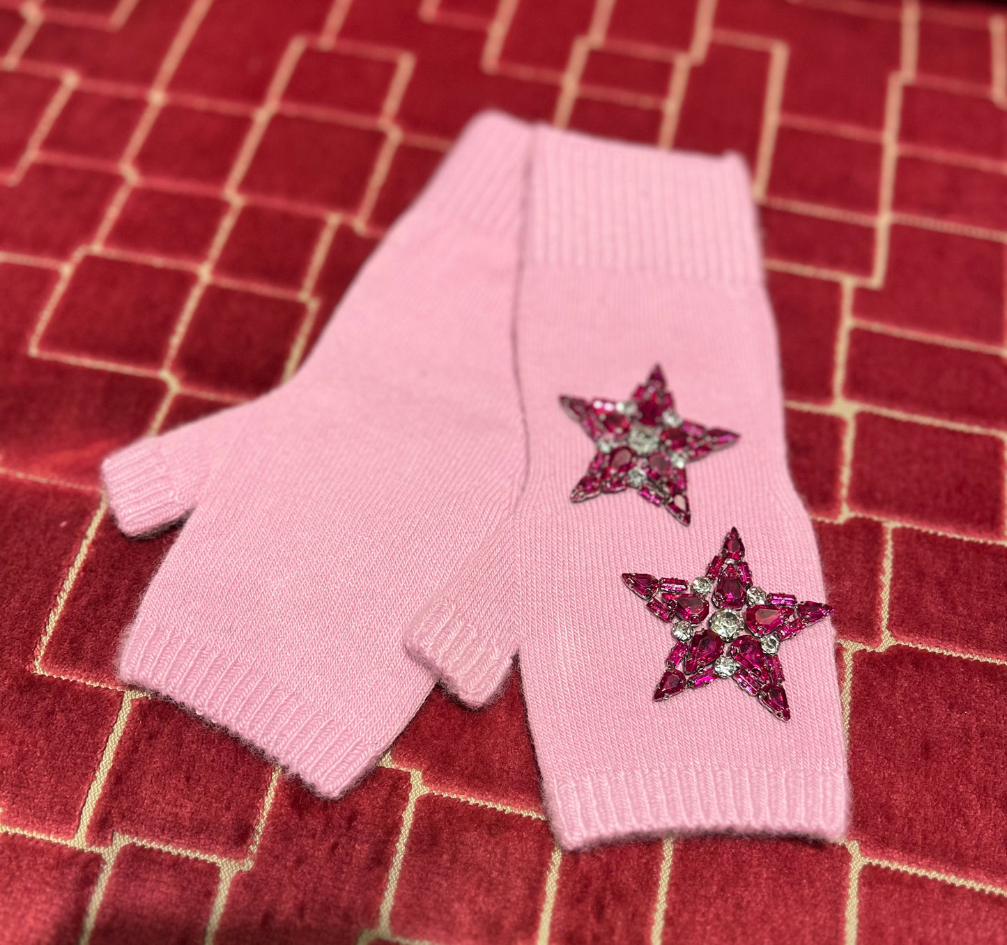 Guanti con stelle rosa