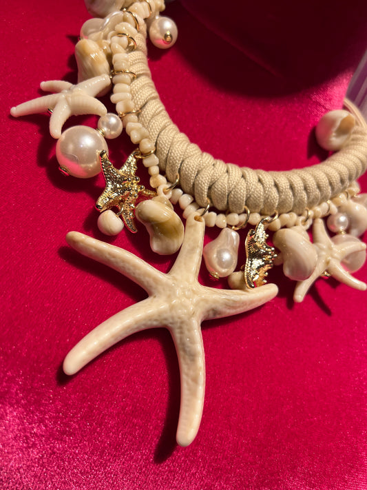 Collana girocollo cordino avorio con stella marina