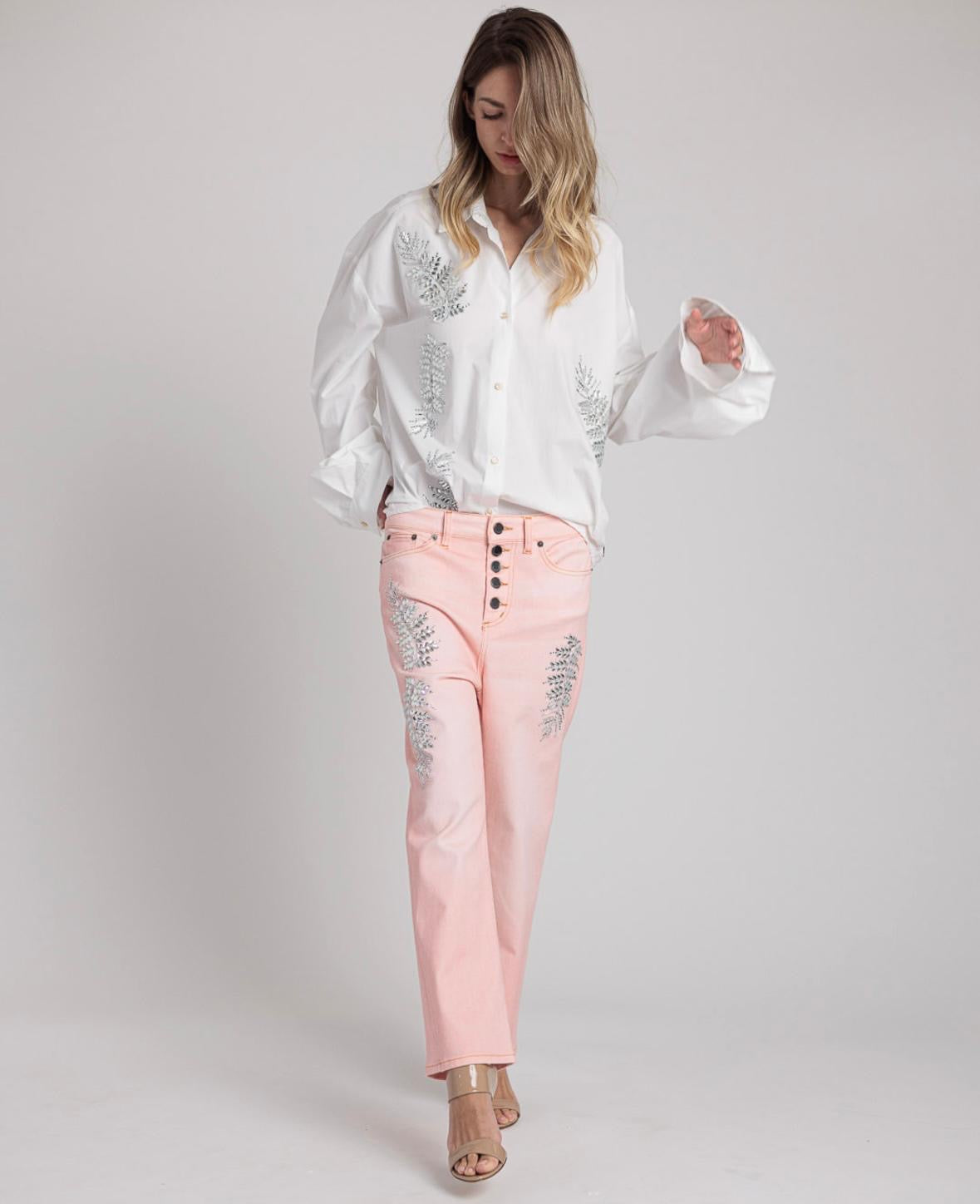 Rossano Perini jeans modello loose rosa pesca con foglie di luce