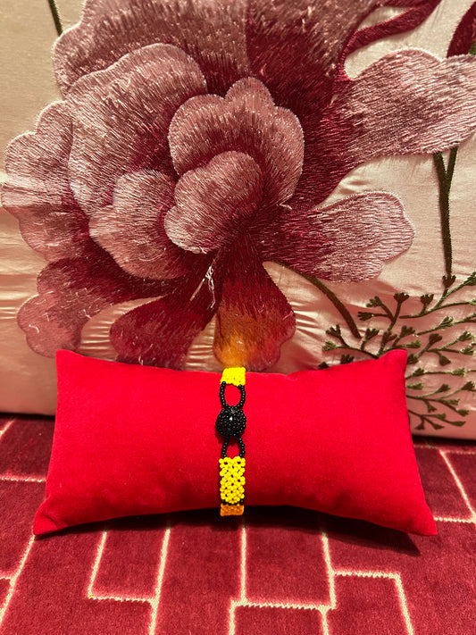 Bracciale perline fiore giallo