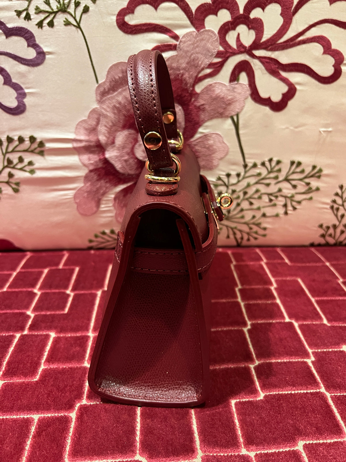 Borsa a mano in pelle burgundi con tracollina
