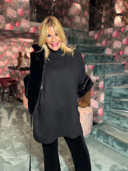 The room completo maglia con collo ecopelliccia rimovibile , manica ecopelliccia e pantalone velluto nero