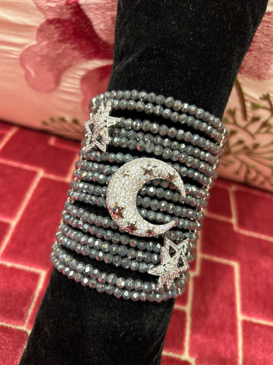 Manuela Ajo’ creazioni bracciale cristalli grigio medio con spille mezza luna e stelle strass