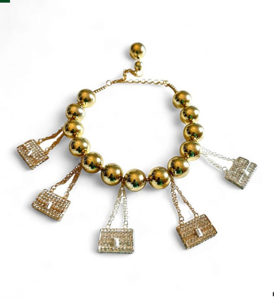 Sereku collana girocollo in resina oro con pendenti a forma di borse cristalli oro e argento