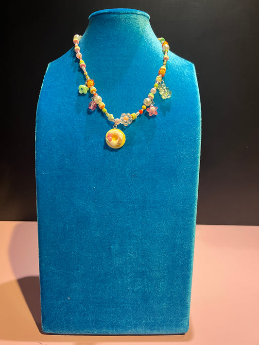 Collana girocollo multicolor con charms fiori orsacchiotti