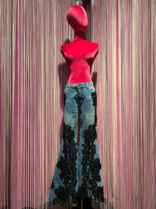 The room jeans elasticizzato a zampa con applicazione pizzo