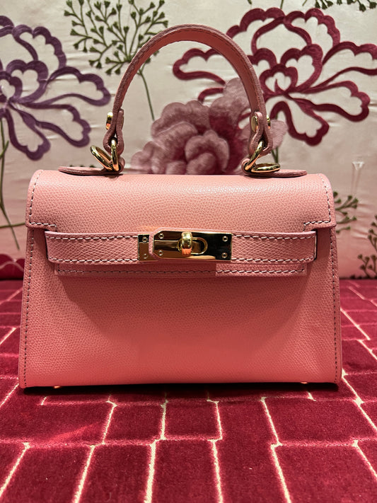 Borsa a mano rosa in pelle con tracolla