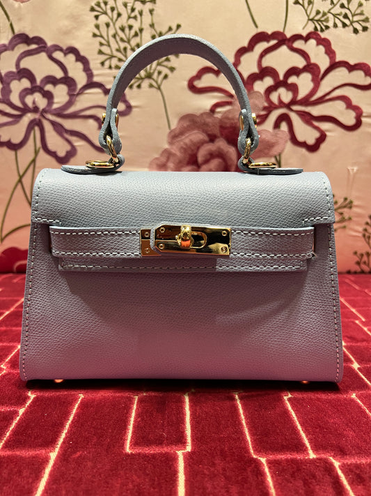 Borsa a mano in pelle celeste con tracolla