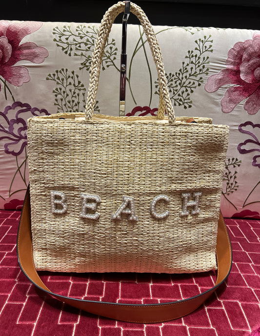 Borsa due manici in paglia intrecciata avorio con scritta “ Beach” tracolla