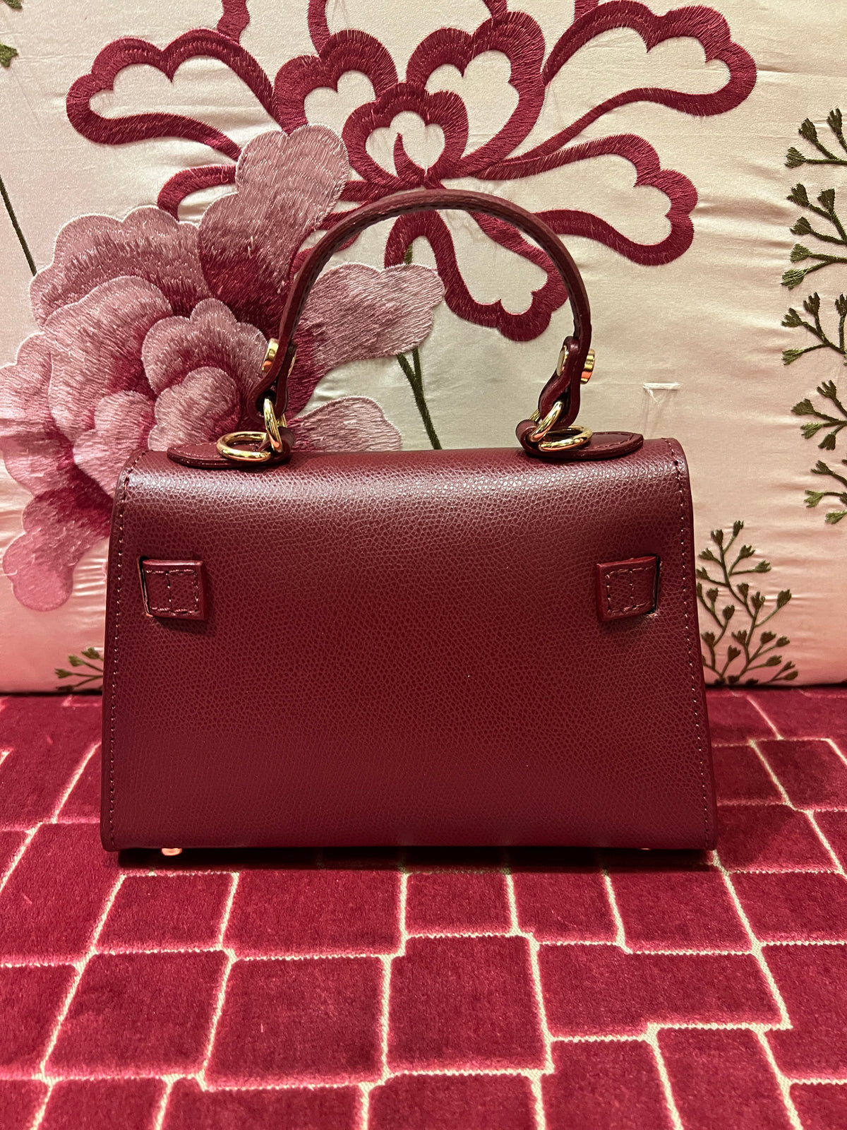 Borsa a mano in pelle burgundi con tracollina