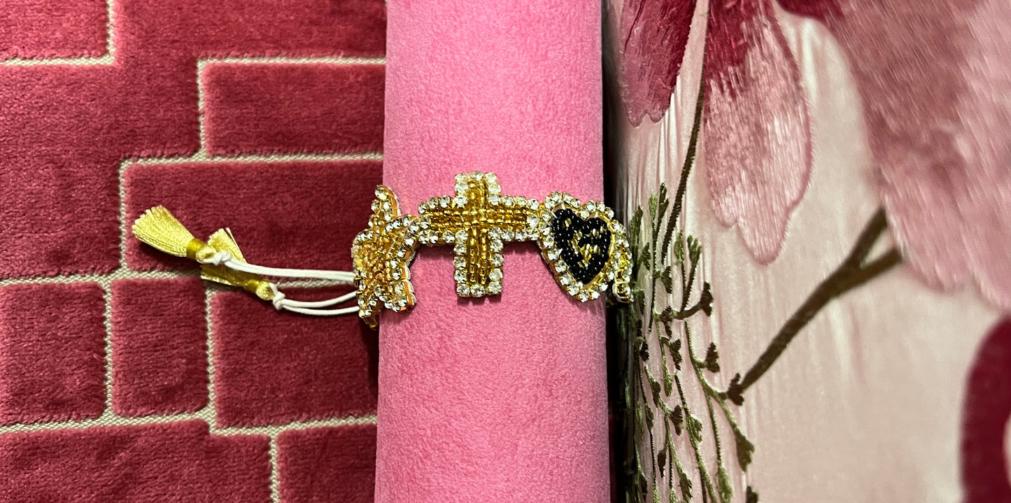 Bracciale stelle e cuori perline regolabile  oro e nero