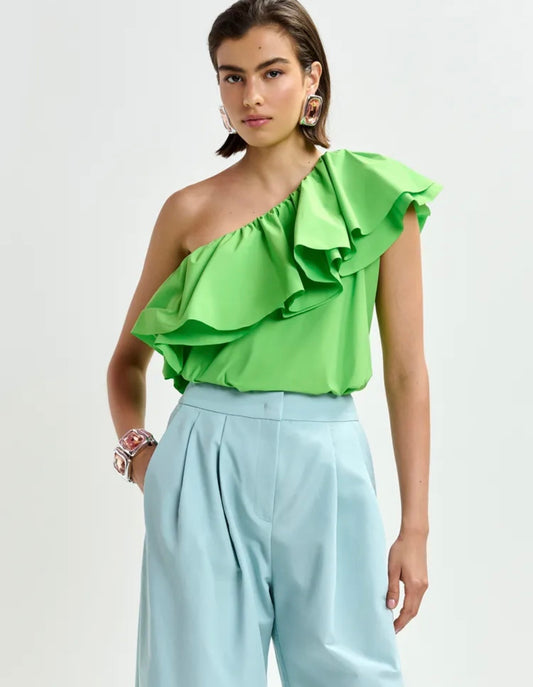 Essentiel antwerp top asimmetrico verde con volant