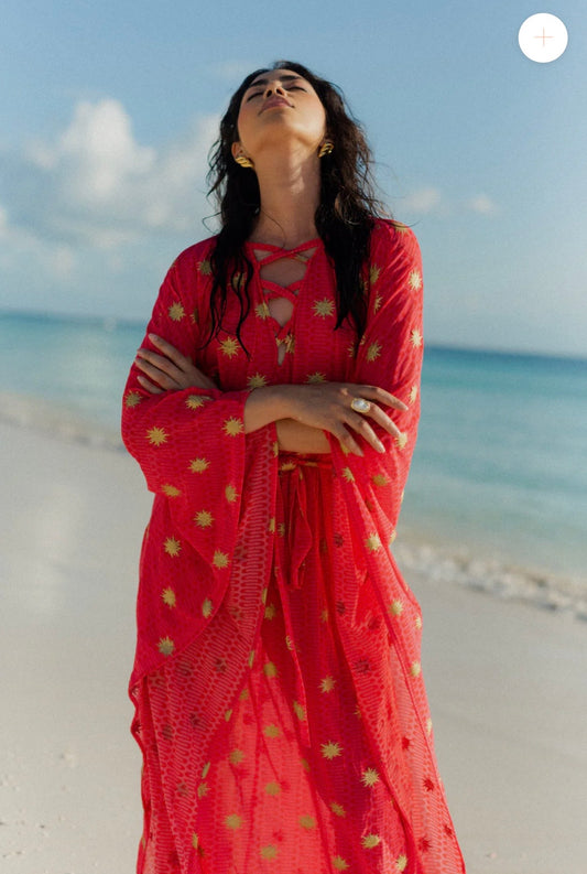 Sundress caftano rosa acceso motivi geometrici ondulatori e stampa glitterata dorata a forma di sole