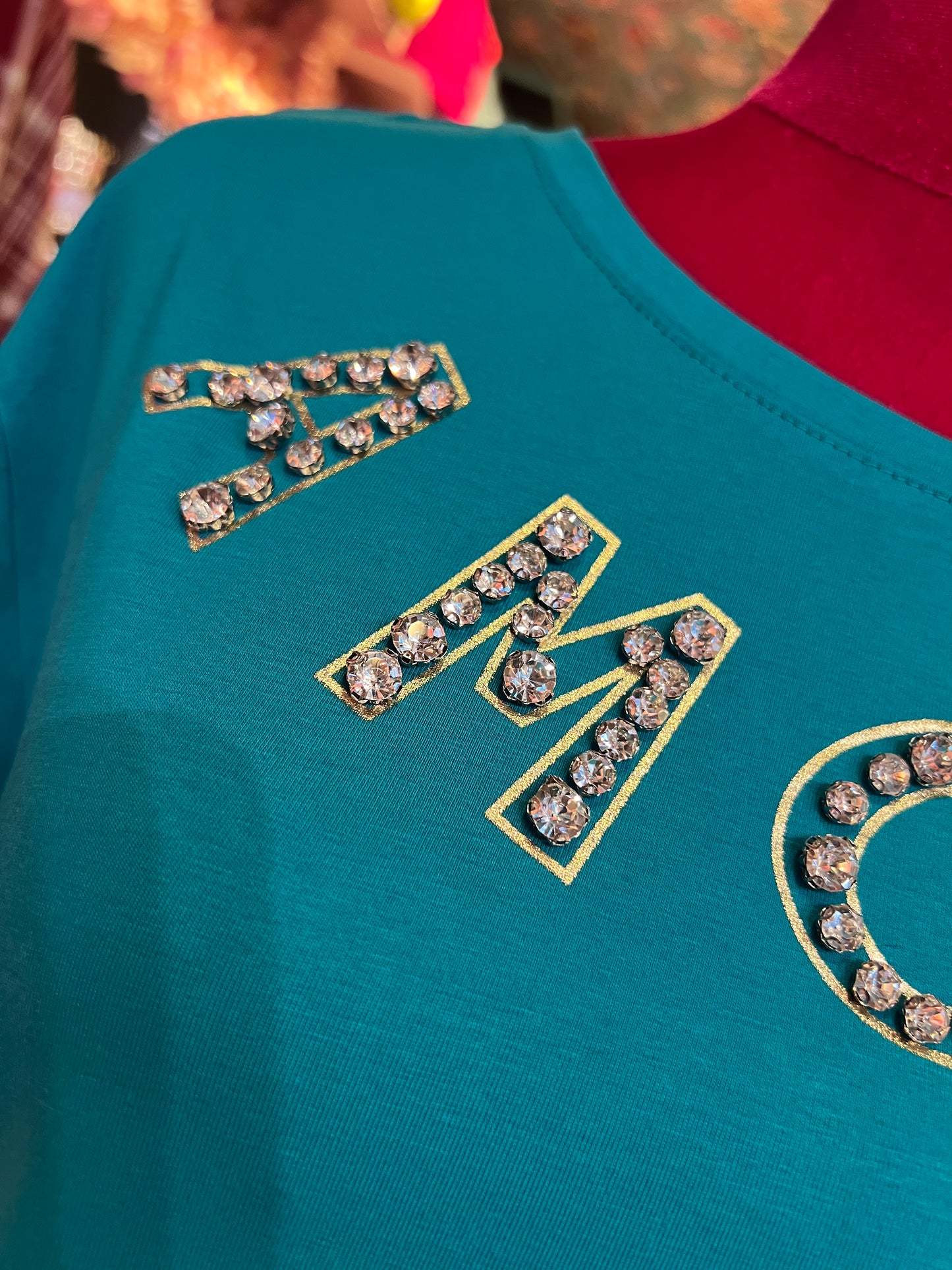 Mon amour Paris sconto -30% t shirt mezza manica verde petrolio con scritta “ Amore” con cristalli