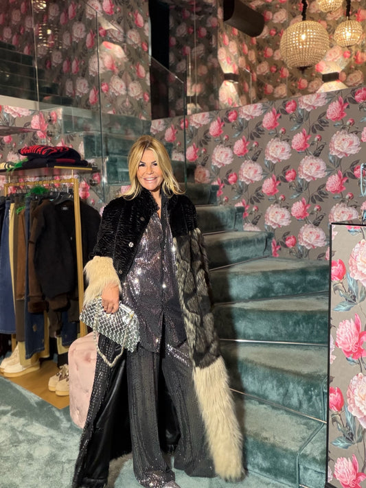 Uncommon cappotto lungo ecopelliccia astrakan nero panna