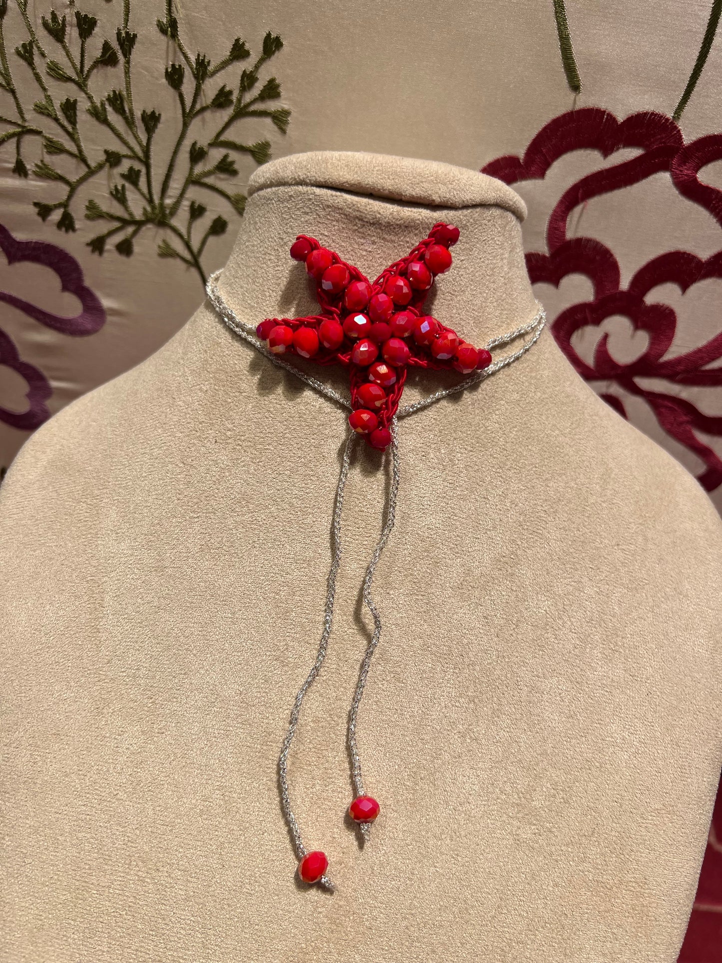 Collana stella con perle rosse