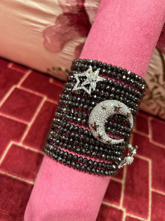 Manuela Ajo’ creazioni bracciale cristalli grigio scuro con spille mezza luna e stelle strass