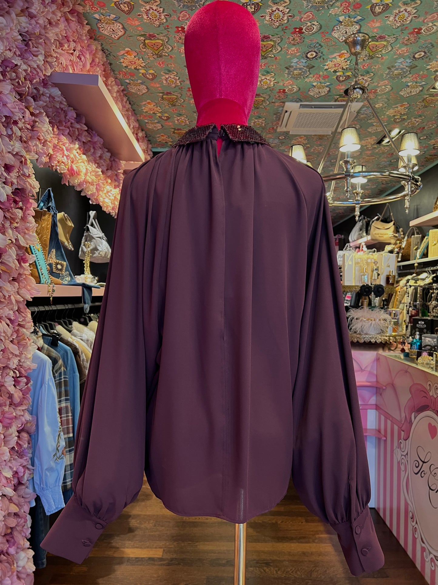 Dahlo blusa drappeggiata con collo in paillettes