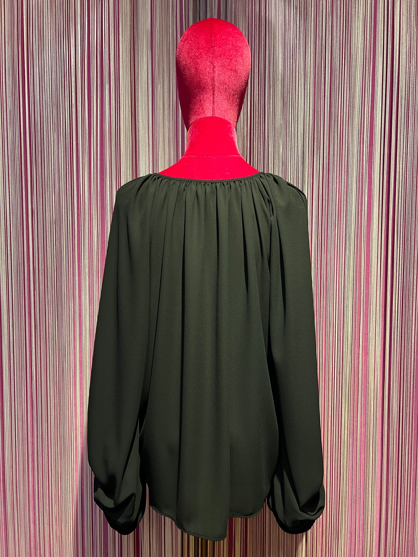 Dahlo blusa girocollo con frangia e maniche ampie