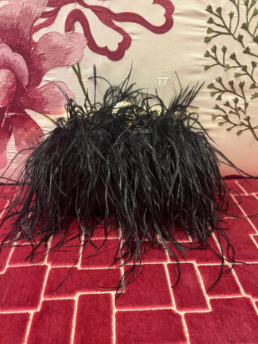 Clutch marabu nera con tracollina