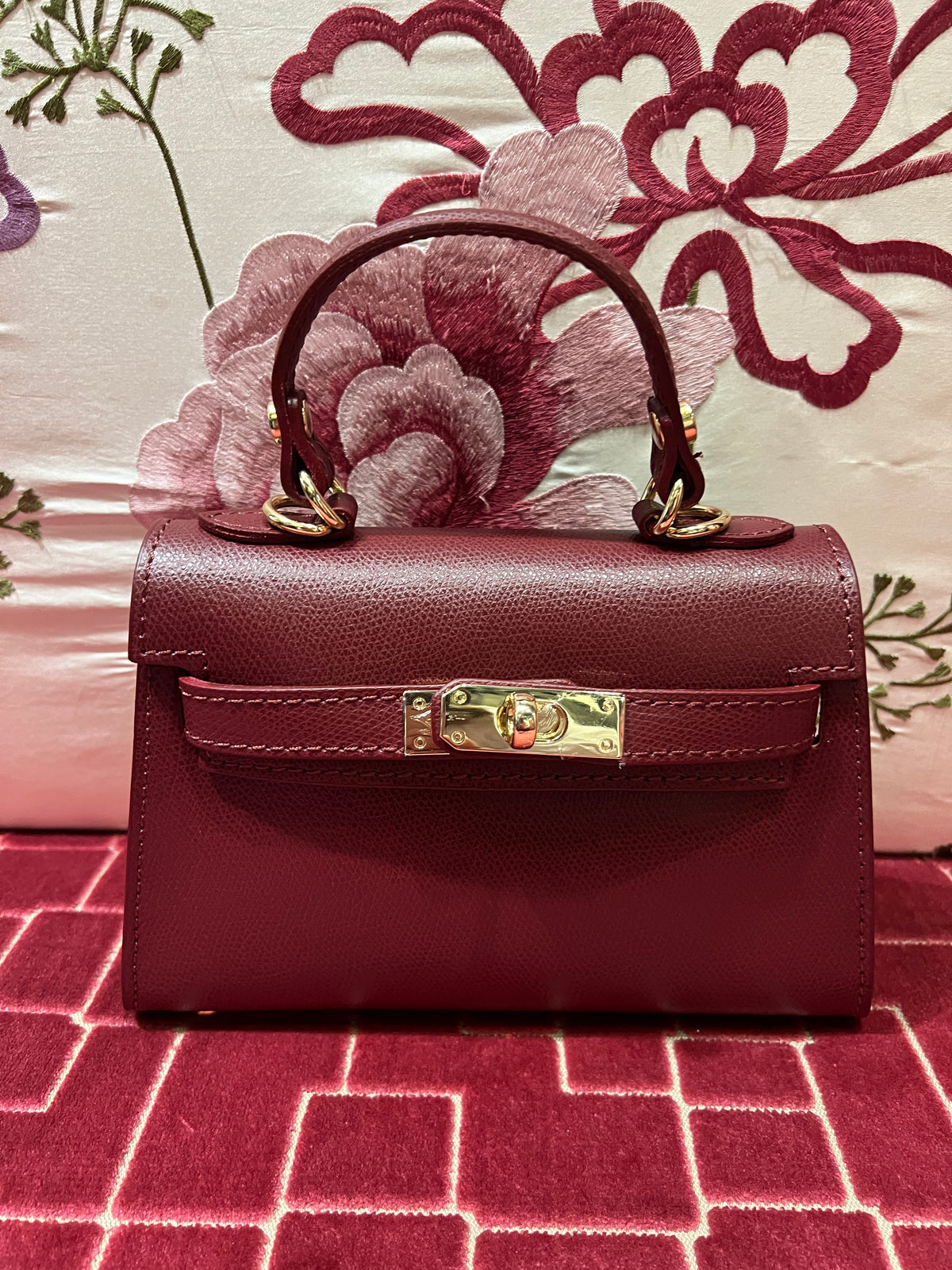 Borsa a mano in pelle burgundi con tracollina