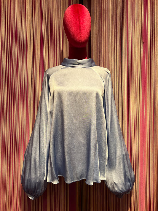 Semicouture camicia celeste scollata dietro manica baloon
