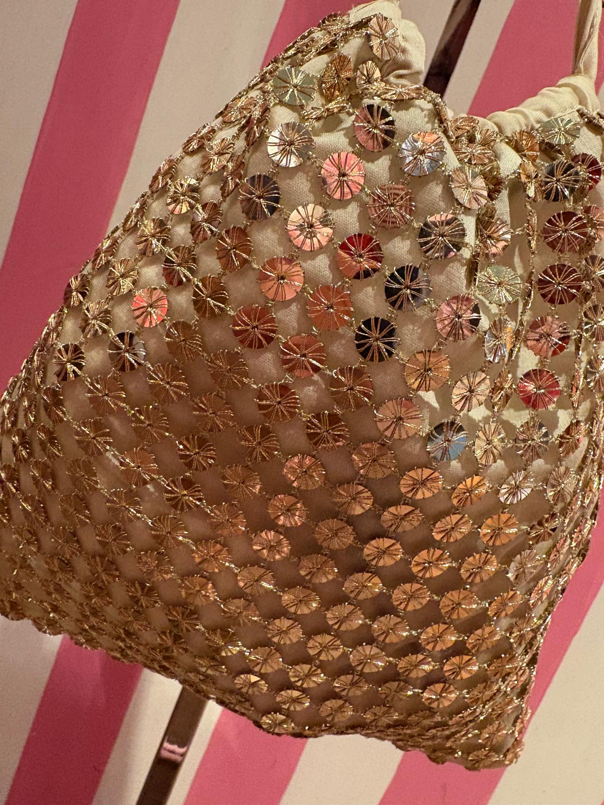 Isabelle Blanche Paris pochette in paillettes oro