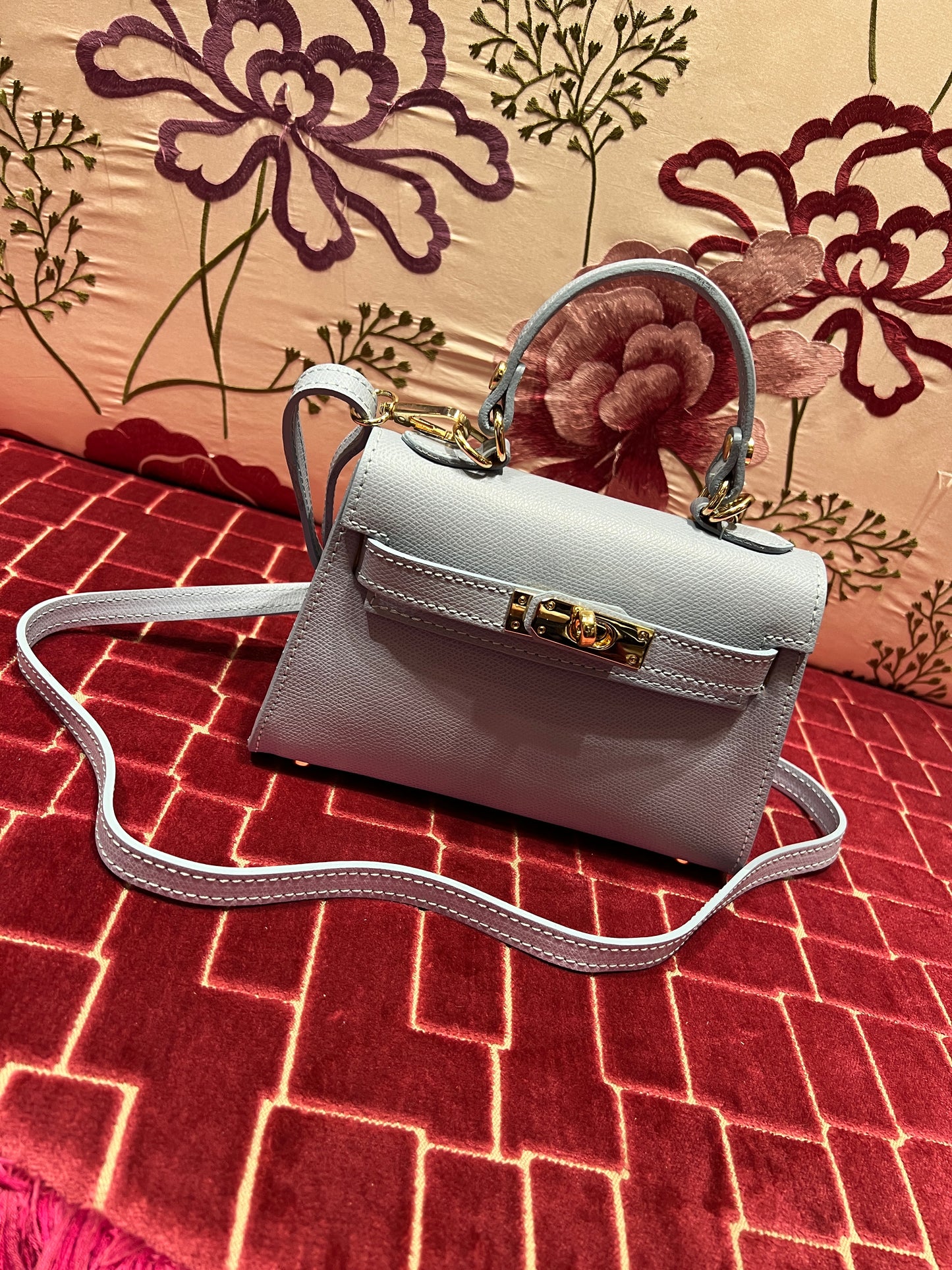 Borsa a mano in pelle celeste con tracolla