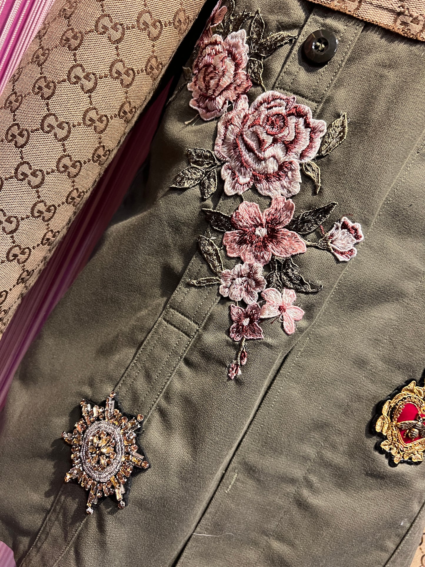 ABpink la verdina , giacca militare con maniche logate e patch fiori cristalli, fiori ricamati e cuore sacro