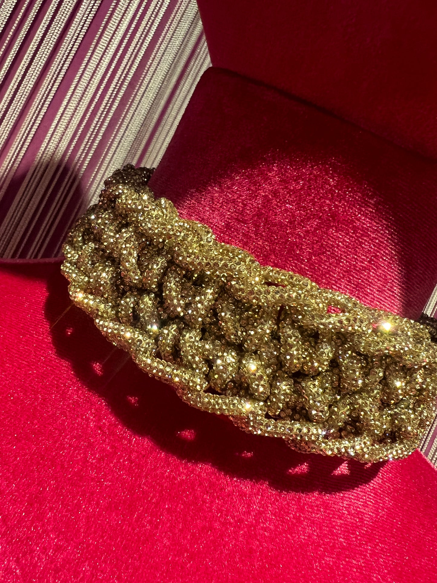 Choker motivo intrecciato dorato